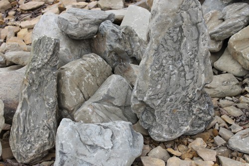 Песчаник декоративный ландшафтный (фр. 300-500 мм)  купить  в Сочи песчаник желтый рыжий серый зеленый валун речной окатанный природный песчаника 4 500 руб/т   фото 
